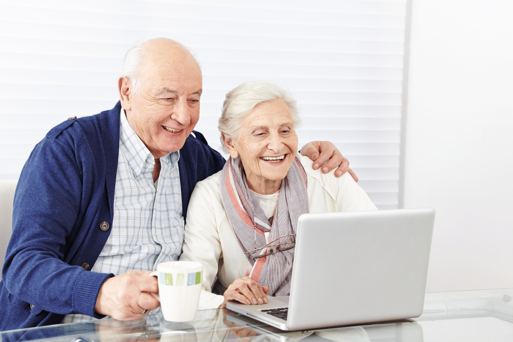 senior-citizen-couple-using-computer-at-home